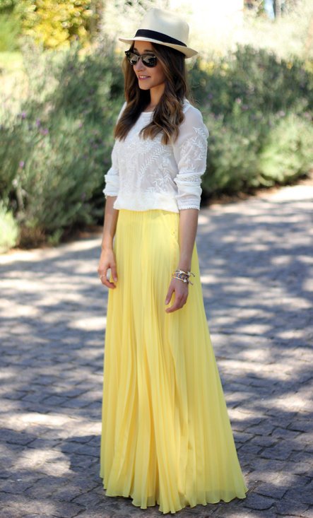 Yellow Skirt With White Top And Hat On Head